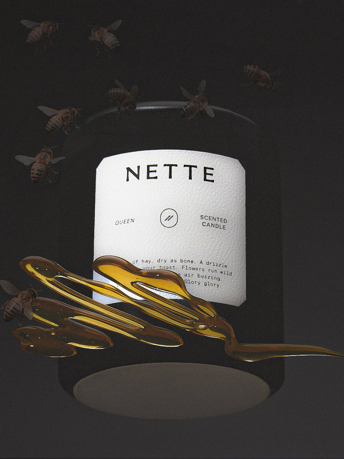 Queen candle in a dark scene with honey drizzling around it