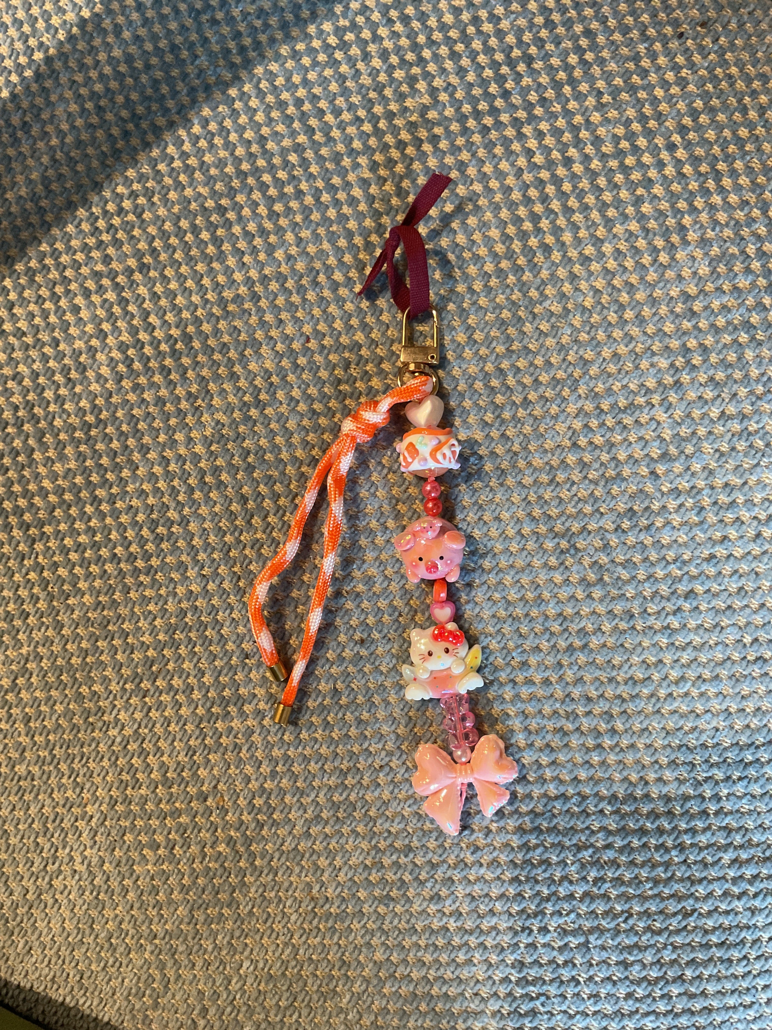 Sweet and Kind Bag Charm 1 bead strands- Orange paracord peach bow