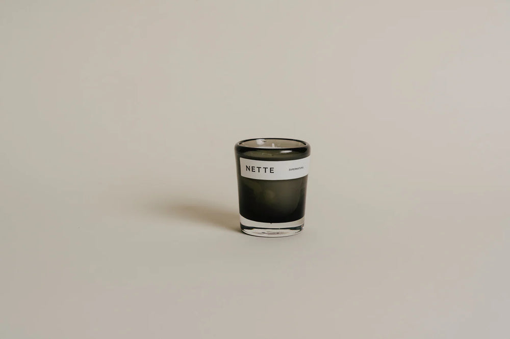 Nette 2.6 oz Smoky Glass Candle - Super Natural