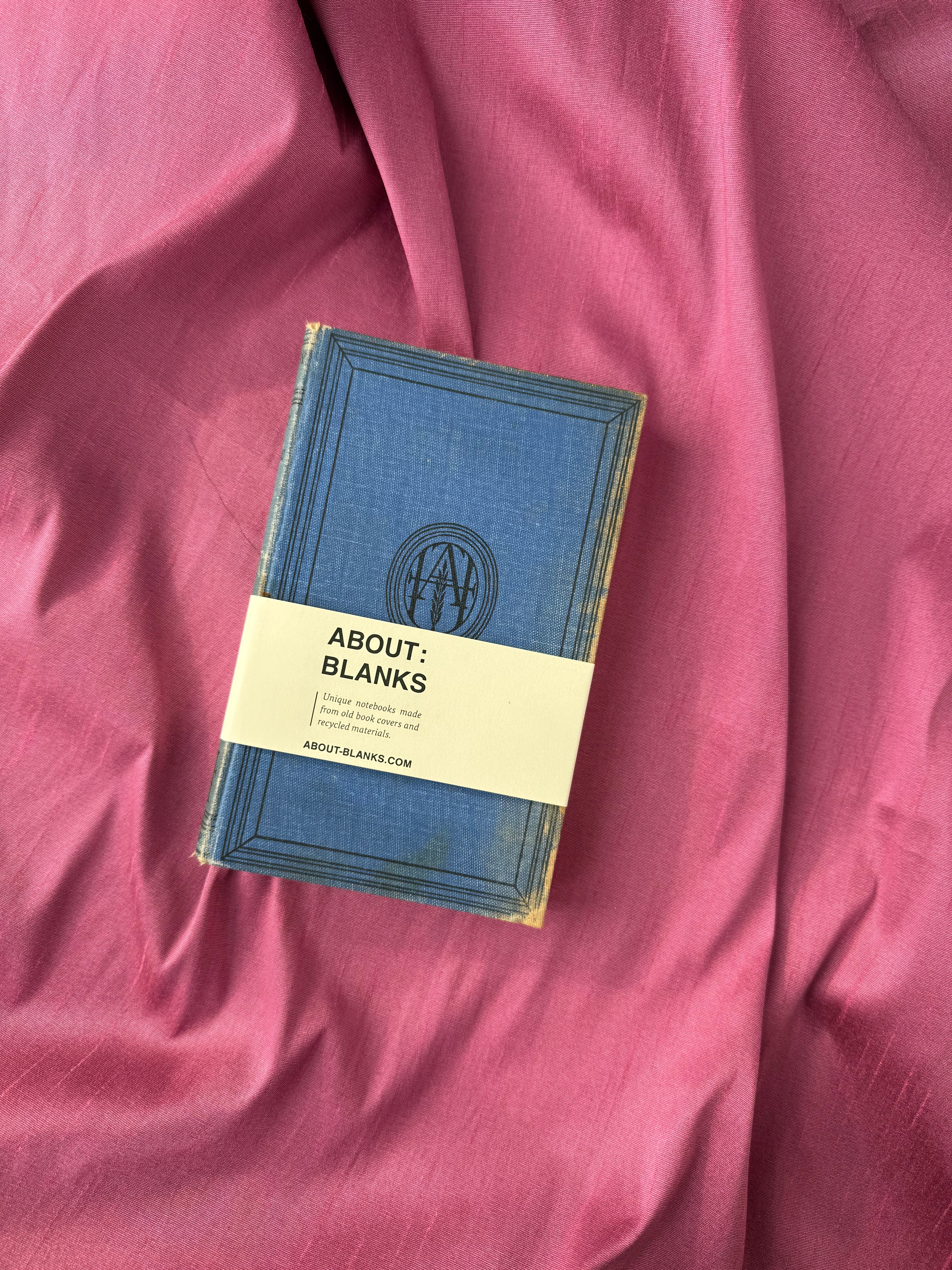 Vintage About Blanks Notebook: blue with crest in border