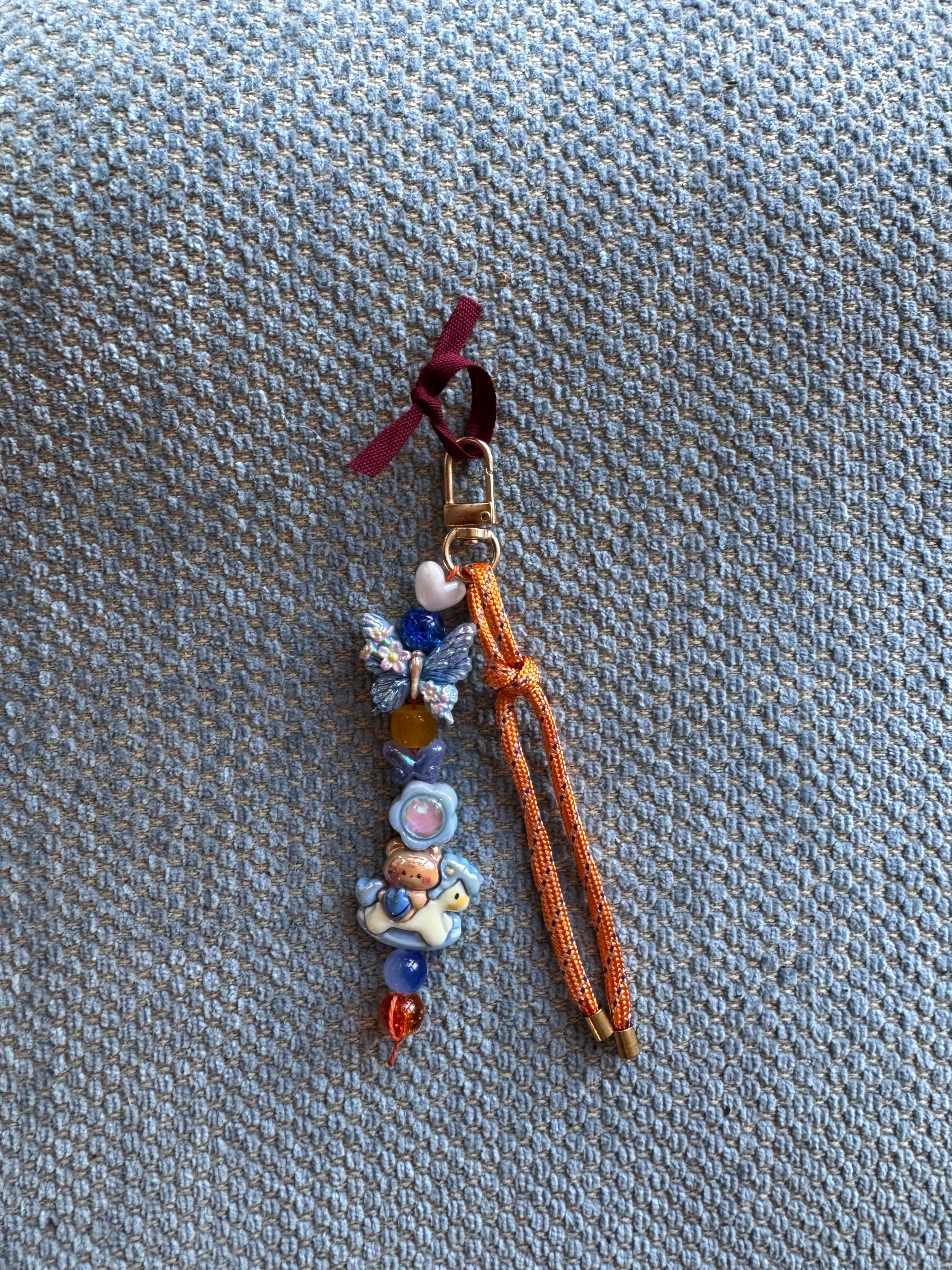 Sweet and Kind Bag Charm 1 bead strands - blue butterfly orange string