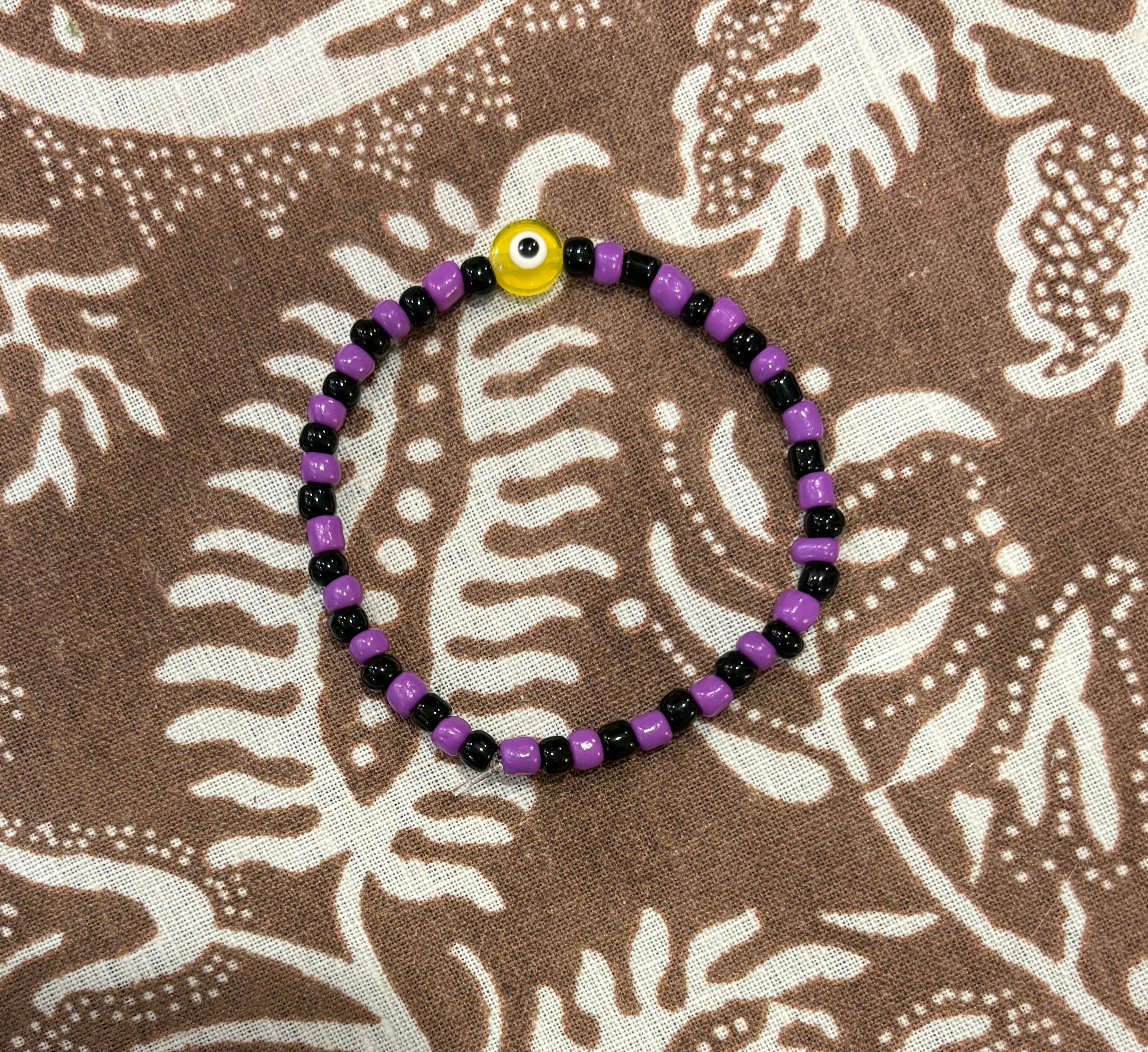 Sweet and Kind - yellow evil eye