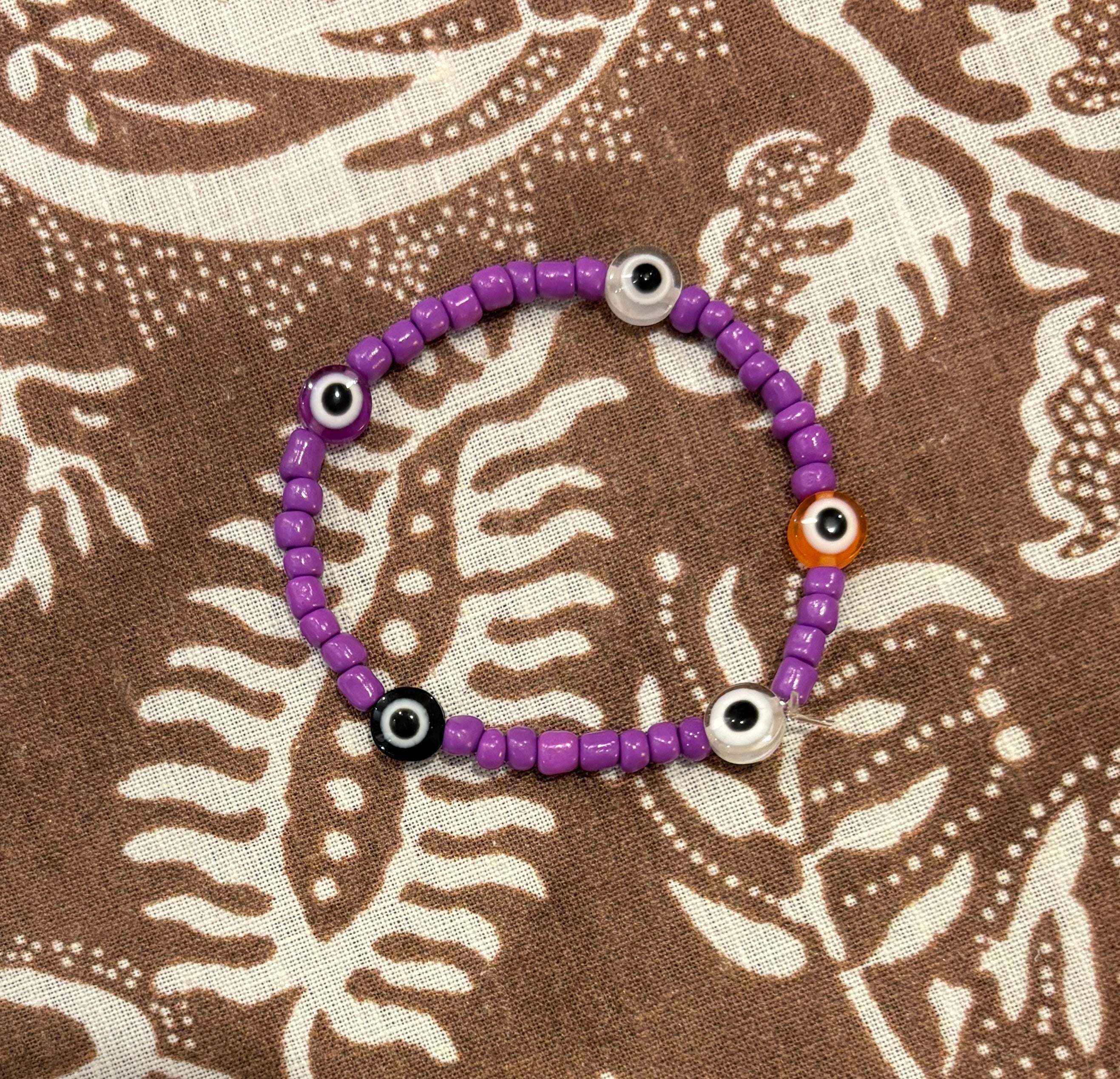 Sweet and Kind - purple and evil eyes
