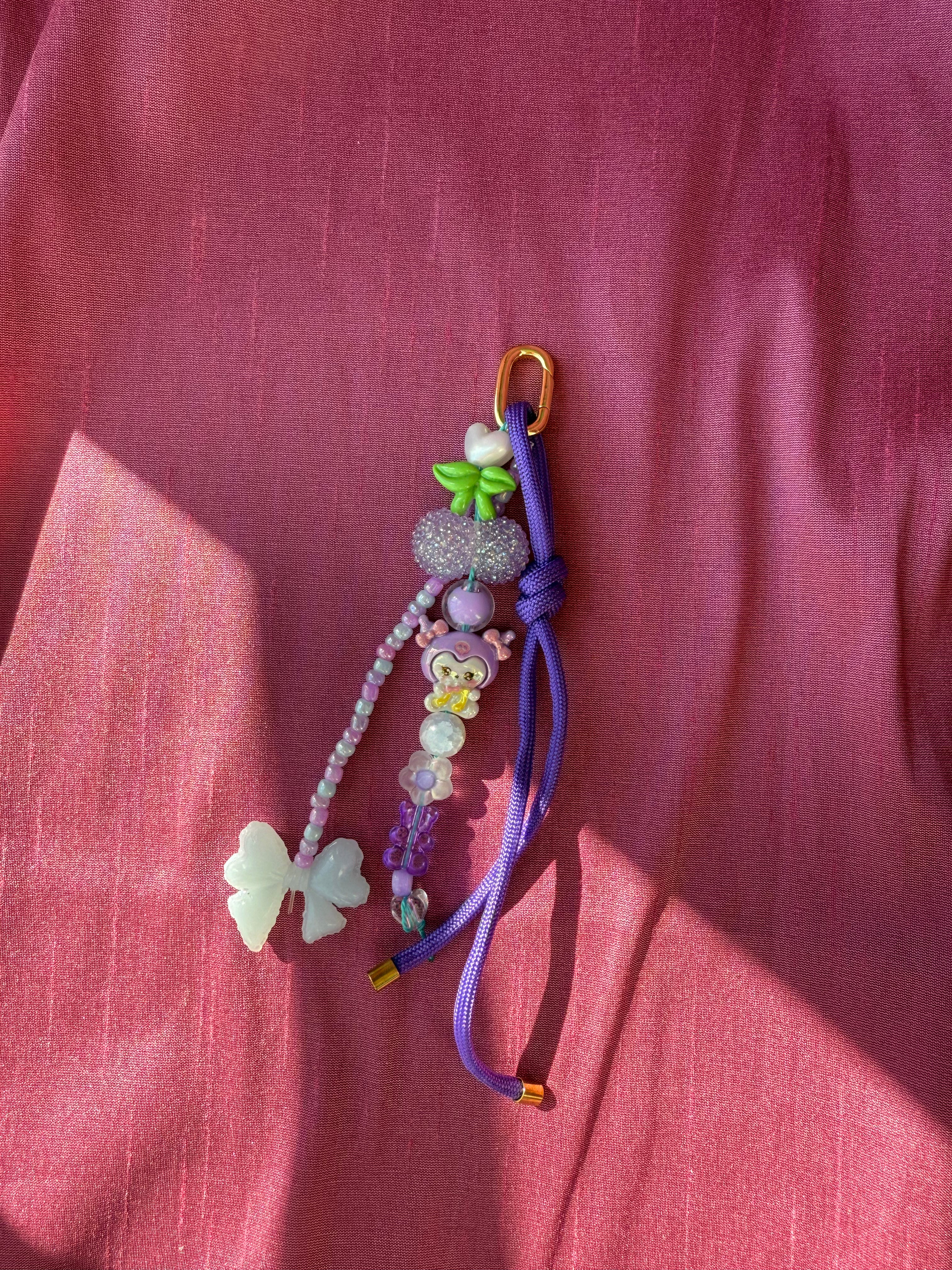 Sweet and Kind Bag Charm - purple paracord with white bow